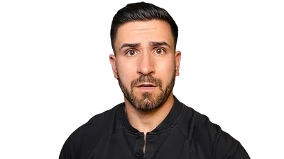 Kevin Söll press photo with a raised eyebrow