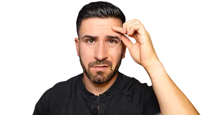 Kevin Söll press photo focused with both hands on his forehead