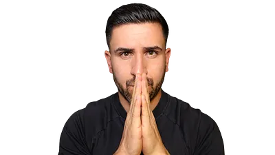 Kevin Söll press photo with hands clasped in front of his face